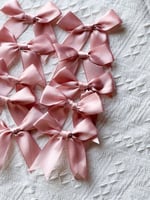 10 فيونكات وردي بيبي