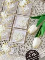 توزيعات 12 شموع الوردة برائحة الاوركيد