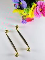 مسكه يد فضي وذهبي