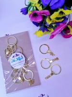 درزن تعليقة مفاتيح ذهبي