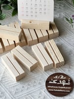 درزن قواعد خشب للورقيات