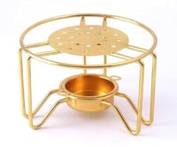 قاعدة شمع ذهبي كبير