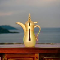 ترمس قهوة شكل دلة ذهبي