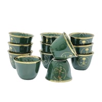 فنجان سيفين ونخلة اخضر وسط