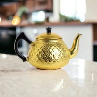 ابريق معدن منقوش تايلاندي ذهبي