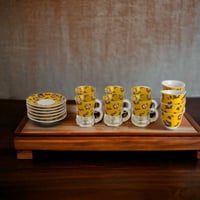 طقم استكانات وصحون و فناجين شالكي أصفر