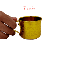 كوب منقوش بيد ذهبي