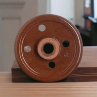 ثقالة ورق عنب فخار