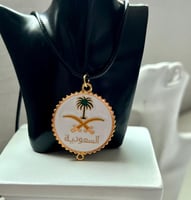 تعليقة السعودية سيفين و نخلة