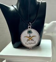 تعليقة السعودية سيفين و نخلة