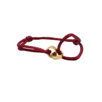 سوارة خيط كارتير - مستوحاه