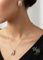 طقم سلسال وحلق سواروفسكي ذهبي و فضي - مستوحى