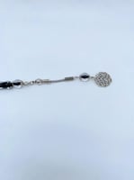 سبحة بكلايت شفافة بخيط اسود