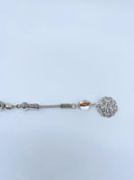 سبحة بكلايت شفافة بخيط بني