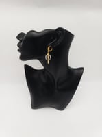 سلسال وحلق كارتير - ذهبي وفضي - مستوحى