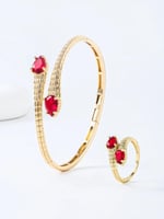 سوارة وخاتم مطليان بالذهب عيار 18 والبلاتينيوم