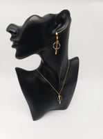 سلسال وحلق كارتير - ذهبي وفضي - مستوحى