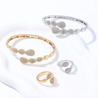 سوارة وخاتم مطليان بالذهب عيار 18 والبلاتينيوم