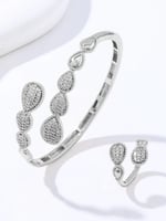 سوارة وخاتم مطليان بالذهب عيار 18 والبلاتينيوم