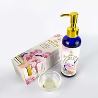 زيت الجسم بالجلوتاثيون وحمض الكوجيك لتفتيح المناطق...