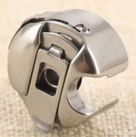 بيت مكوك ماكينه معدني