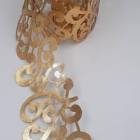 كلف جلد ذهبي لاصق طول متر