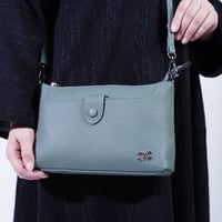 شنطه جلد طبيعي حجم وسط