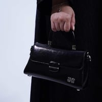 شنطه بهيرة جلد الحجم وسط