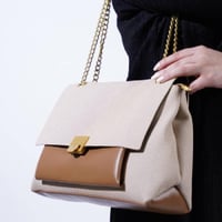 شنطه كتف نسائية بهيرة قماش وسط