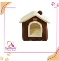 بيت قطط على شكل كوخ