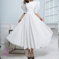 فستان ابيض ناعم ميد من كيوتشي