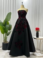 فستان سهرة اسود بورود حمراء من الترتر