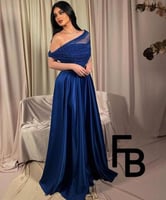 فستان سهرة نيلي بفصوص راقية جدًا – من كيوتشي CUTEC...