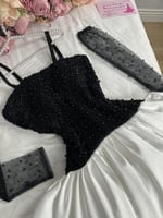 فستان سهرة ملكي أبيض وأسود مطرز لؤلؤ