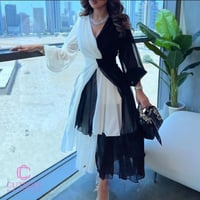 فستان أسود وأبيض بطبقات شيفون ناعمة | موديلات فسات...