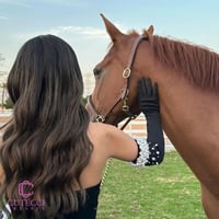 فستان سهرة أسود صدر لؤلؤ بكم منفصل من كيوتشي – إطل...