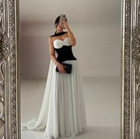 فستان سهرة جنزابيتي أبيض وأسود من CUTECCI