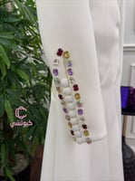 فستان سهرة أبيض مزين بفصوص