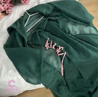 جلابيه زيتي بشت جزار برباط جانبي من كيوتشي