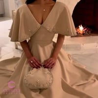 فستان سهرة بيج 2025 | فساتين سهرة فخمة من كيوتشي