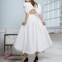 فستان ابيض ناعم ميد من كيوتشي