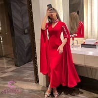 فستان سهرة أحمر كريب بتطريز يدوي – 2025 | كيوتشي