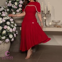 فستان احمر ميد جريء وراقي من كيوتشي