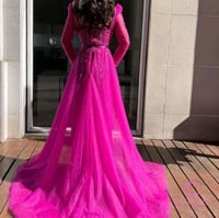 فستان ترتر فوشي سهرة جريء بذيل من كيوتشي