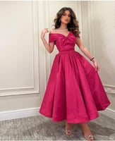 فستان سهرة ميدي مكشكش بكتف مكشوف