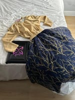 فستان سهره بتطريز فاخر وأكمام ذهبية