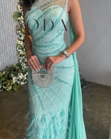 فستان سهرة تركوازي ريش مميز