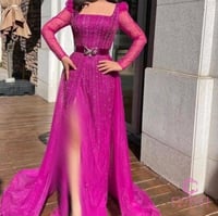 فستان ترتر فوشي سهرة جريء بذيل من كيوتشي