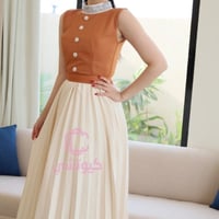 فستان بيج رسمي بنمط مكسر من كيوتشي | تصميم 2025 لل...