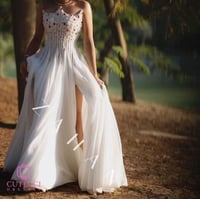 فستان ابيض سهرة صدر مطرز من كيوتشي CUTECCI